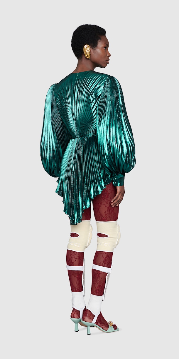 الإطلالة 77 Back Side