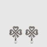 Earrings in silver with glass pearls