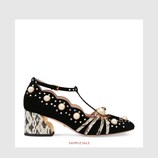Studded mid-heel pump