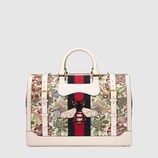 Floral tapestry duffle with Web