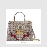 Iside snakeskin top handle bag