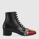 Leather boot with pierced moon