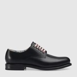 Black leather lace-up shoe