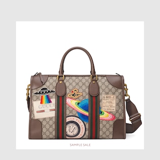 Borsa da viaggio Gucci Courrier in GG Supreme