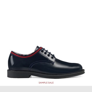 Scarpa in pelle con dettaglio Web