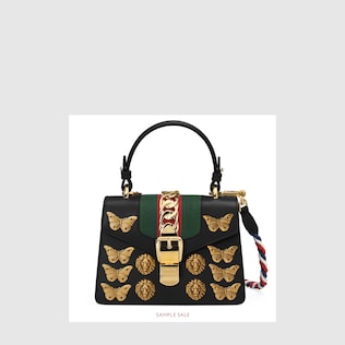 Mini borsa Sylvie in pelle con borchie a motivo animale