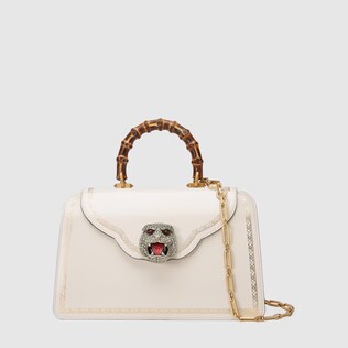 Frame print leather top handle bag