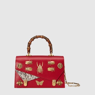 Henkeltasche aus Leder mit Insekten