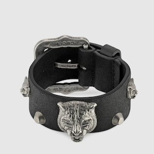 Leather bracelet with feline heads