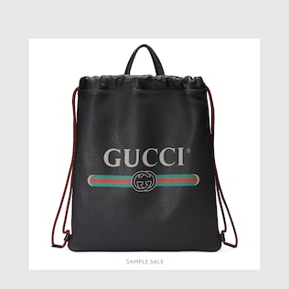 Sac à dos en cuir imprimé Gucci avec cordon coulissant