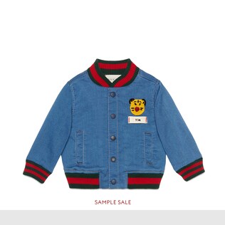 Bomber in jersey denim con patch