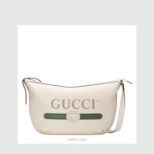 حقيبة هوبو هلالية الشكل بطبعة Gucci