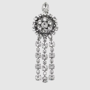 Metal brooch with crystals