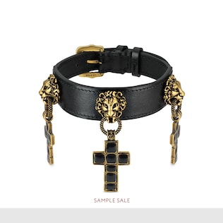 Leather bracelet with cross pendants