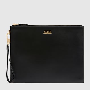 Leather pouch with Gucci logo