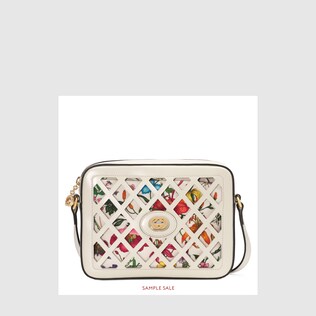 Small cutout leather shoulder bag