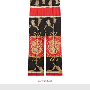 Silk pant with flowers and tassels