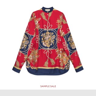 Oversize shirt with flowers and tassels