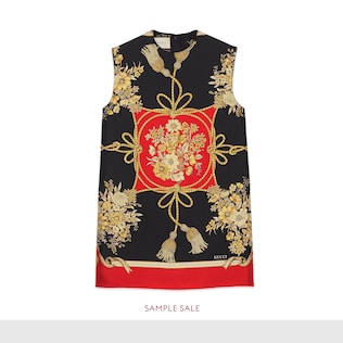 Tunic top with flowers and tassels