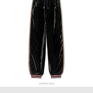 Bi-material track bottoms