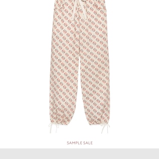 Bi-material track bottoms
