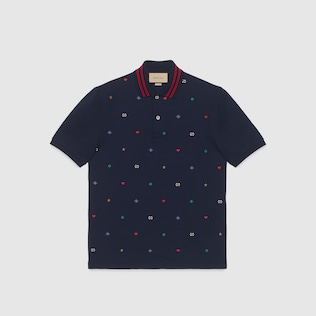 Polo avec broderies symboles