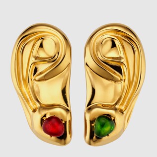 Metal ear brooches with cabochon stones