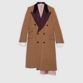 Cappotto asimmetrico in lana con cuciture