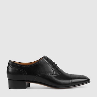 Leather lace-up with brogue detail