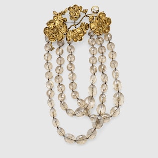 Beaded brooch with floral detail