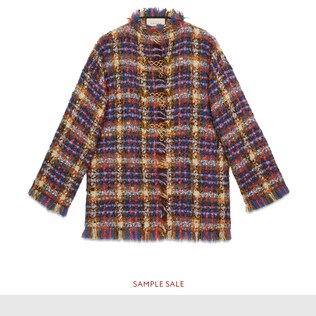 Tweed jacket with lion head toggles