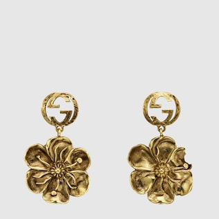 Metal earrings with floral detail
