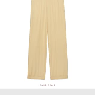 Pantalone in lana spigata a gamba larga