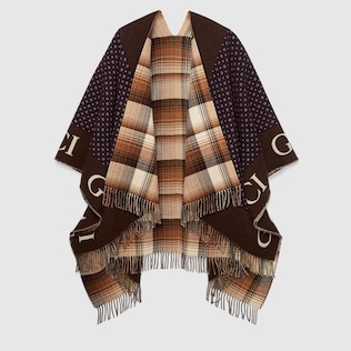 Reversible wool poncho with geometric motif