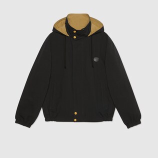 جاكيت ذو وجهين مع شعار Gucci Orgasmique