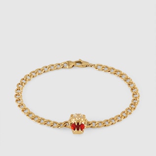 Bracelet tête de lion 18 carats avec opale rouge feu