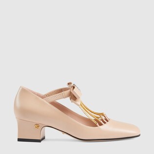 Women's mid-heel pump with crystal bow