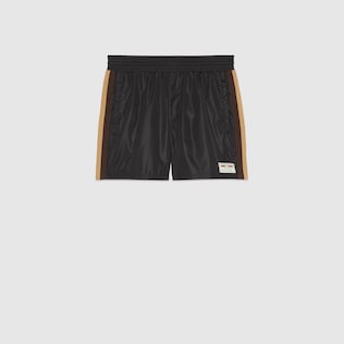 Short de bain avec étiquette Gucci