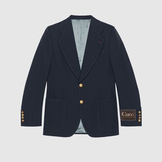 جاكيت من الصوف مزيّن بملصق Gucci