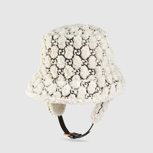 Curly GG eco fur hat with ear flaps
