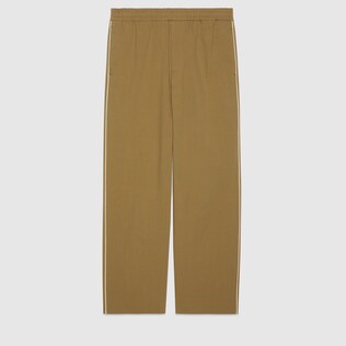 Gucci logo print cotton nylon trousers