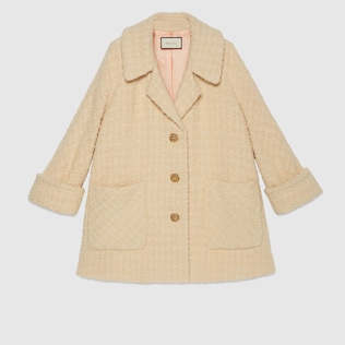 Manteau en fourrure d’agneau bouclée