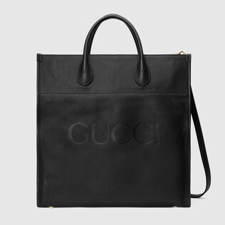 حقيبة يد كبيرة مزيّنة بشعار Gucci