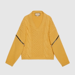 Cable knit jumper with detachable sleeves
