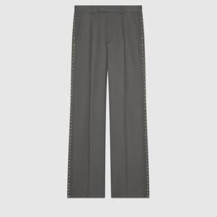 Trousers with stud embroidery
