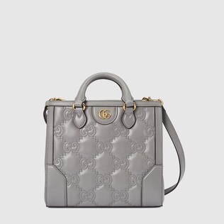 Mini-Henkeltasche aus GG Matelassé-Leder