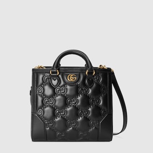 GG matelassé mini top handle bag