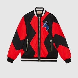 Veste zippée en jersey technique à motif zigzag
