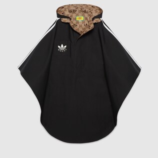 معطف كاب بوجهَين من مجموعة adidas x Gucci