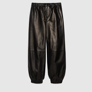 Pantalon en cuir avec étiquette Gucci